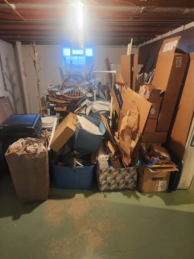 Roll-off dumpster container at job site for Construction Dumpster Rental in Fenton